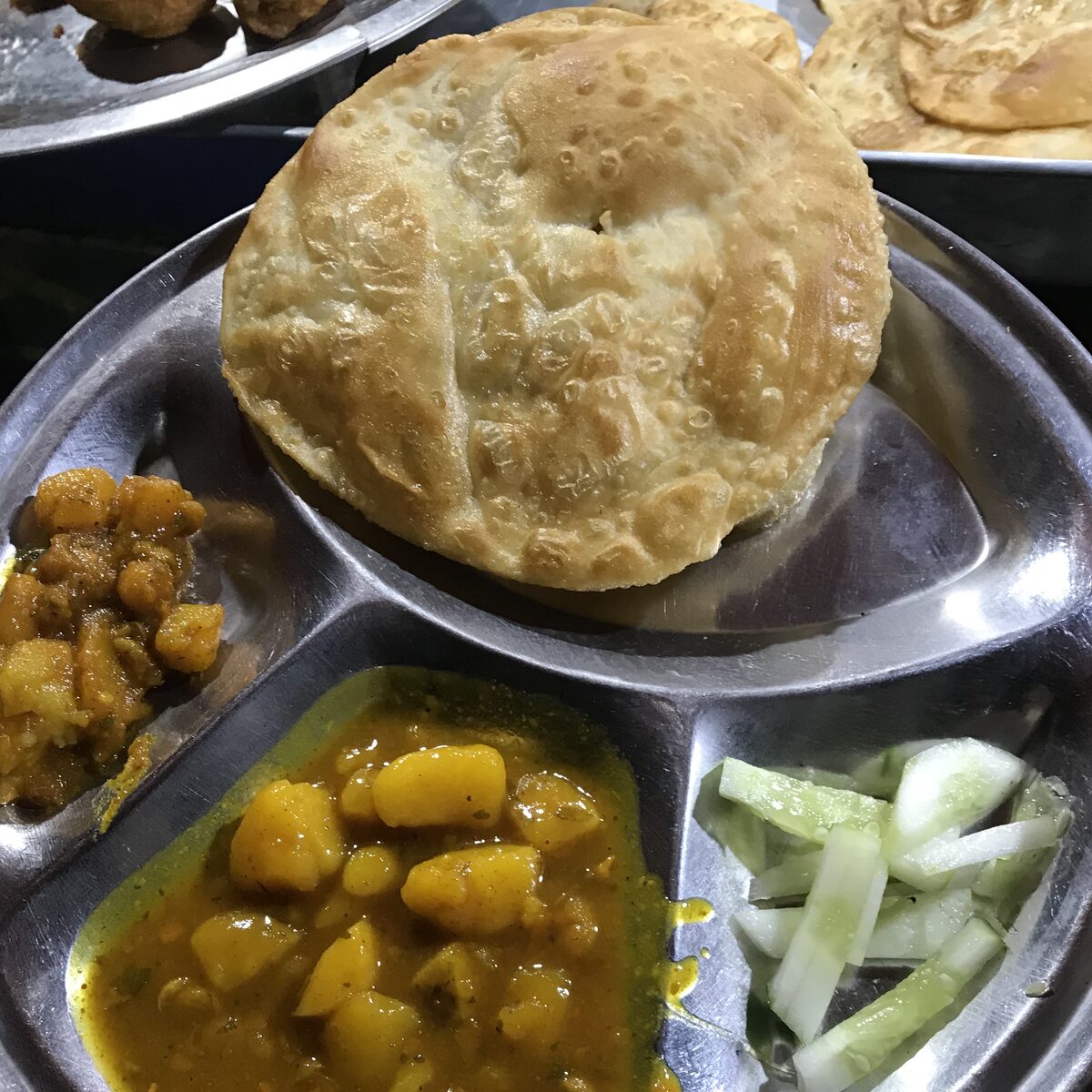 Kachori with aloo sabzi and fresh cucumber